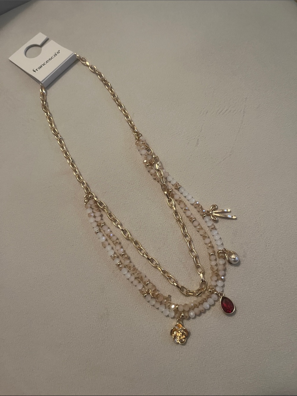 Francesca's Collections Gold Multi-Strand Charm Necklace - Cream and Red Accents